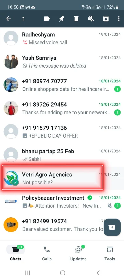 Tapping and holding a contact name that is showing in red colour box of whatsapp cht screen.