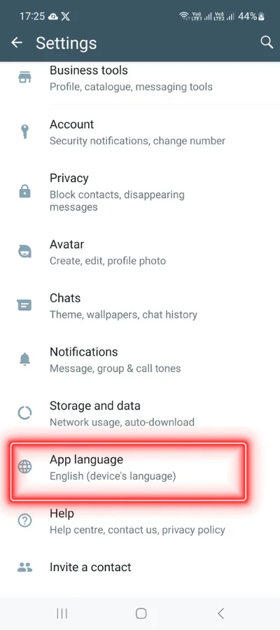 In the red colour box showing the icon of "app language" in whatsapp setting 
